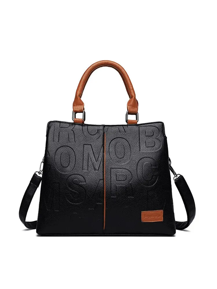 2023 New Fashion Solid Color Shoulder Large Capacity Soft Leather Cloth Letter Embossed Ladies Handbag