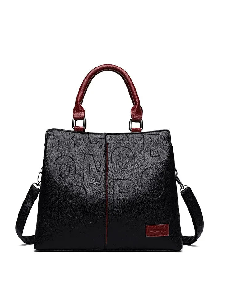 2023 New Fashion Solid Color Shoulder Large Capacity Soft Leather Cloth Letter Embossed Ladies Handbag